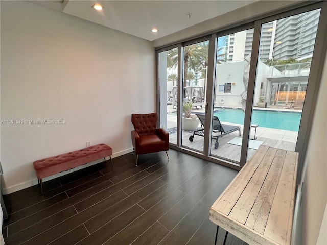851 NE 1st Ave Unit Caba Pb23, Miami, FL 33132 - living area with dark wood finished floors, baseboards, and recessed lighting