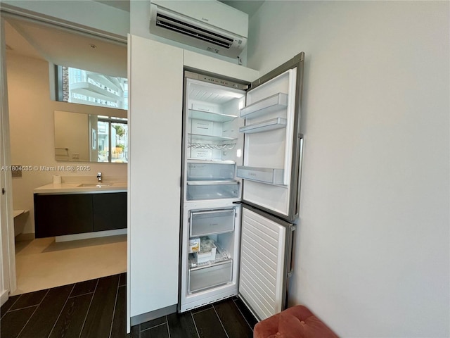 851 NE 1st Ave Unit Caba Pb23, Miami, FL 33132 - bathroom with a wall mounted AC, wood tiled floors, and vanity