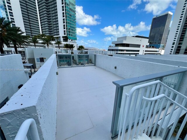851 NE 1st Ave Unit Caba Pb23, Miami, FL 33132 - view of patio with a balcony and a view of city