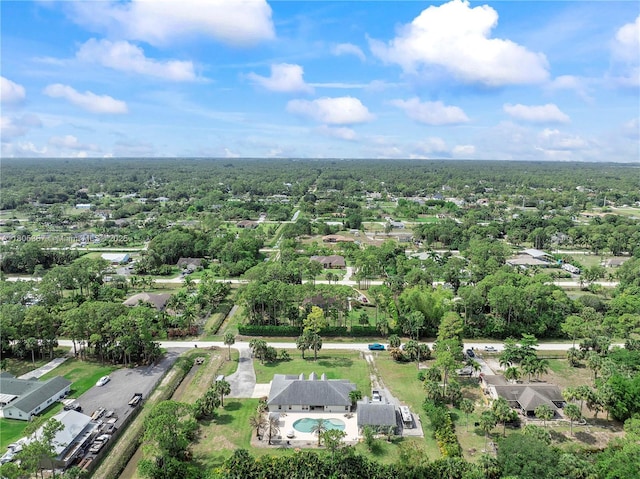 16783 92nd Ln, Loxahatchee, FL 33470 - aerial view of property and surrounding area with a pool and nearby suburban area