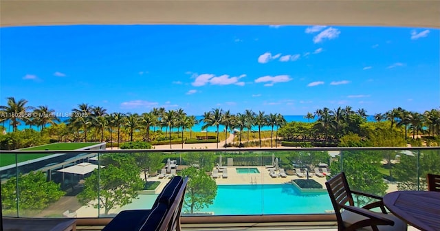 10203 Collins Ave Unit 302, Bal Harbour, FL 33154 - community pool with a hot tub and a water view