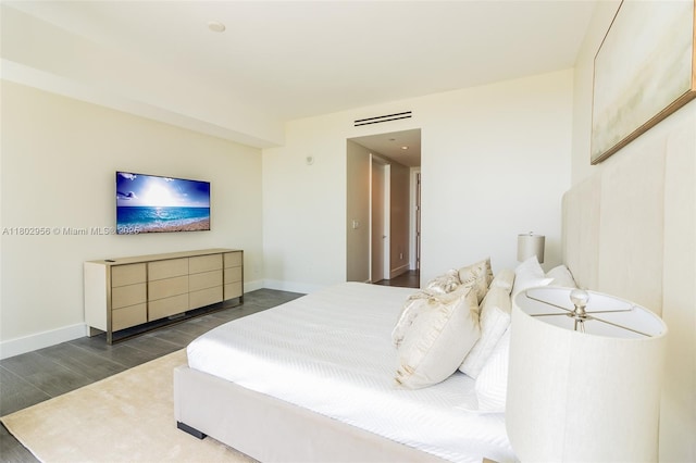 10203 Collins Ave Unit 302, Bal Harbour, FL 33154 - bedroom featuring wood finished floors and baseboards