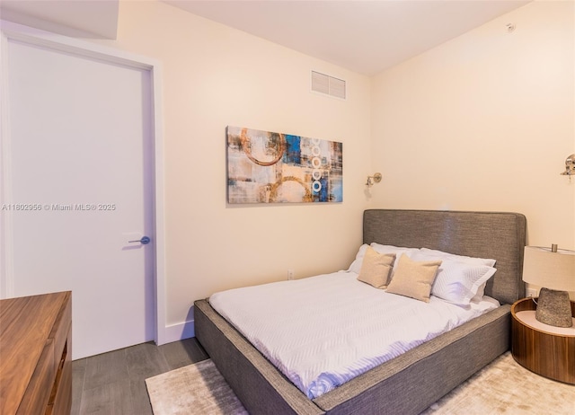 10203 Collins Ave Unit 302, Bal Harbour, FL 33154 - bedroom with wood finished floors