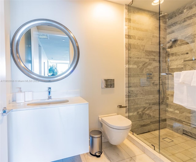 10203 Collins Ave Unit 302, Bal Harbour, FL 33154 - bathroom with a tile shower, vanity, and toilet
