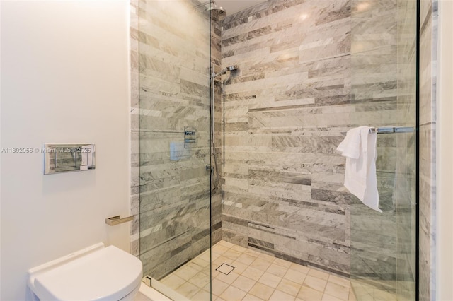10203 Collins Ave Unit 302, Bal Harbour, FL 33154 - bathroom with a stall shower and toilet