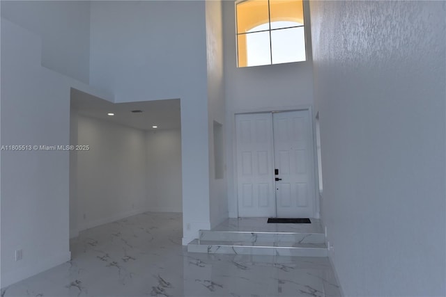 2925 SW 133rd Ave, Miramar, FL 33027 - entrance foyer with a high ceiling, marble finish floors, and baseboards
