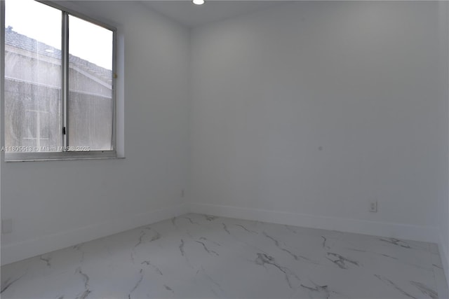 2925 SW 133rd Ave, Miramar, FL 33027 - empty room featuring baseboards, marble look tile flooring, and recessed lighting