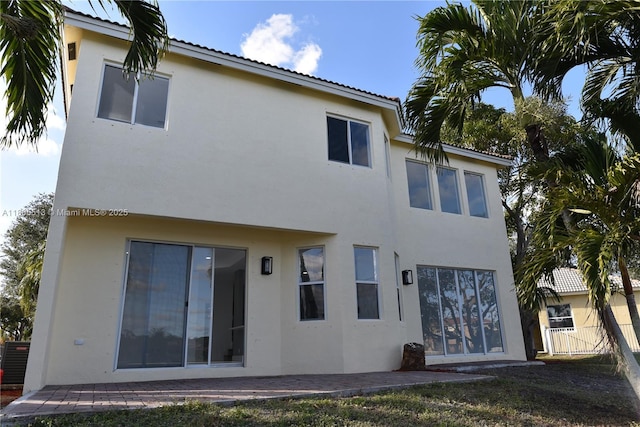2925 SW 133rd Ave, Miramar, FL 33027 - rear view of property featuring stucco siding, central air condition unit, and fence