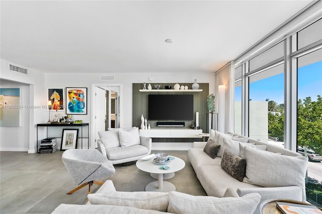 1201 20th St Unit 314, Miami Beach, FL 33139 - living area featuring finished concrete flooring and baseboards