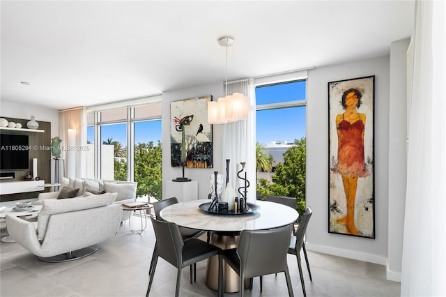 1201 20th St Unit 314, Miami Beach, FL 33139 - dining area with baseboards