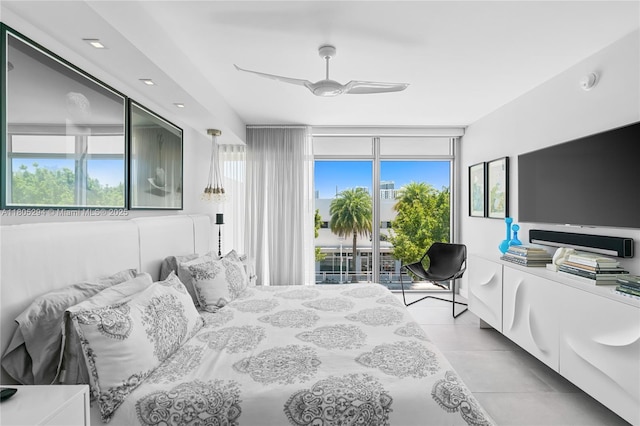 1201 20th St Unit 314, Miami Beach, FL 33139 - bedroom featuring access to outside, light tile patterned floors, expansive windows, and a ceiling fan