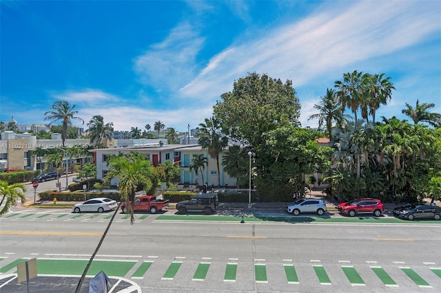 1150 Euclid Ave Unit 305, Miami Beach, FL 33139 - view of asphalt road with street lights and curbs
