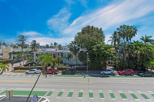 1150 Euclid Ave Unit 305, Miami Beach, FL 33139 - view of asphalt road with street lights and curbs