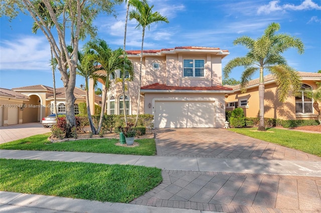 5957 NW 125th Ave, Coral Springs, FL 33076 - mediterranean / spanish house with stucco siding, driveway, a garage, and a tile roof