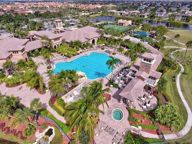 5957 NW 125th Ave, Coral Springs, FL 33076 - aerial view of residential area featuring a pool and a nearby body of water