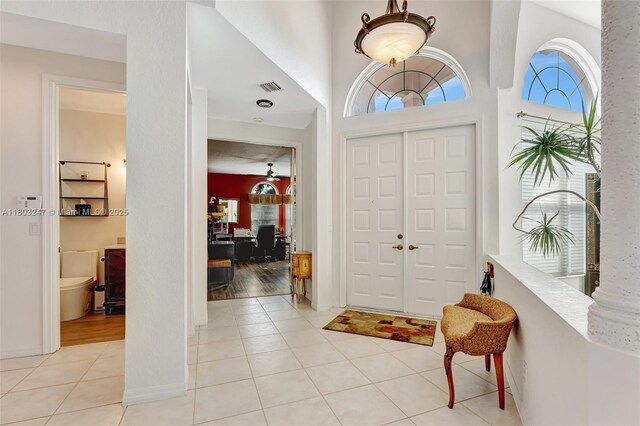 5957 NW 125th Ave, Coral Springs, FL 33076 - foyer entrance featuring light tile patterned floors