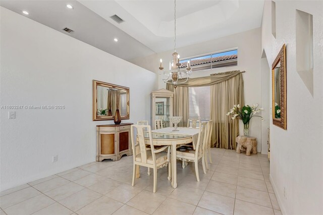 5957 NW 125th Ave, Coral Springs, FL 33076 - dining room with a chandelier, a towering ceiling, light tile patterned floors, and recessed lighting
