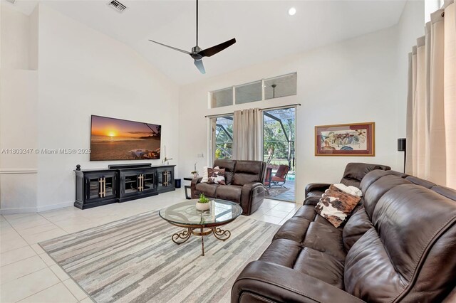 5957 NW 125th Ave, Coral Springs, FL 33076 - living area with high vaulted ceiling, tile patterned flooring, a ceiling fan, recessed lighting, and baseboards