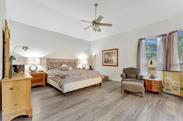 5957 NW 125th Ave, Coral Springs, FL 33076 - bedroom featuring light wood-style flooring, baseboards, and a ceiling fan