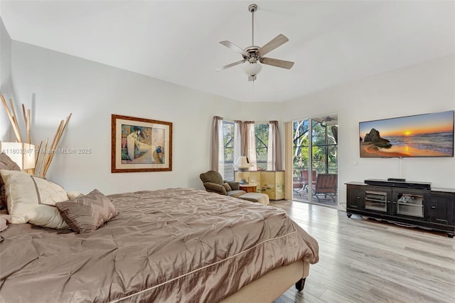 5957 NW 125th Ave, Coral Springs, FL 33076 - bedroom featuring access to exterior, wood finished floors, and a ceiling fan