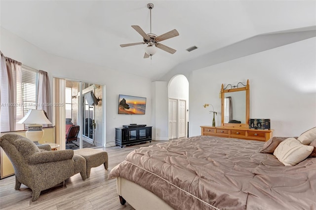 5957 NW 125th Ave, Coral Springs, FL 33076 - bedroom with vaulted ceiling, light wood finished floors, arched walkways, a ceiling fan, and a closet