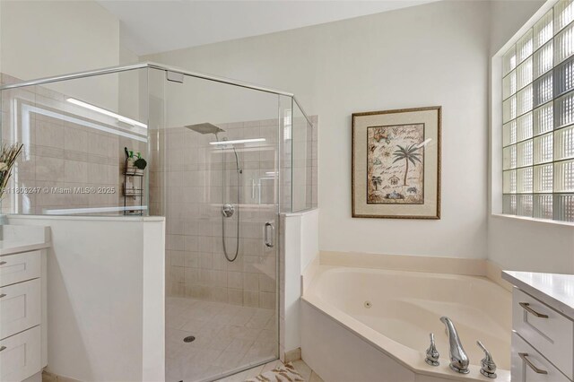 5957 NW 125th Ave, Coral Springs, FL 33076 - bathroom featuring vanity, a whirlpool tub, and a stall shower