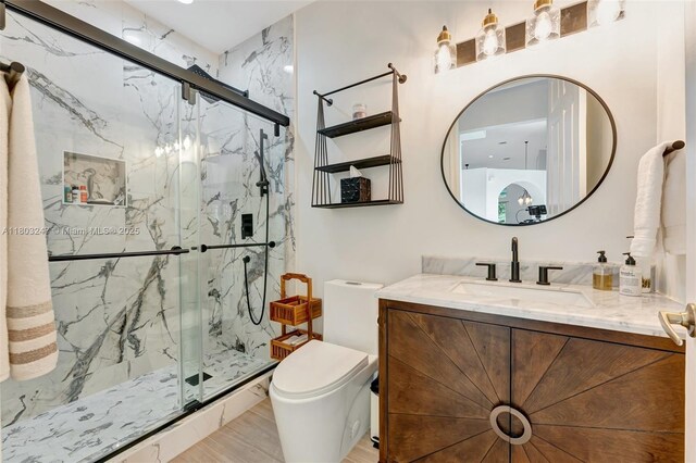 5957 NW 125th Ave, Coral Springs, FL 33076 - full bath with toilet, vanity, and a marble finish shower