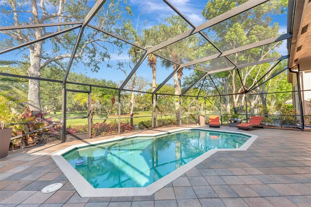 5957 NW 125th Ave, Coral Springs, FL 33076 - outdoor pool featuring a patio and glass enclosure