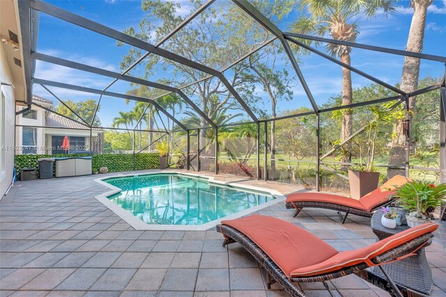 5957 NW 125th Ave, Coral Springs, FL 33076 - outdoor pool featuring a patio and a lanai