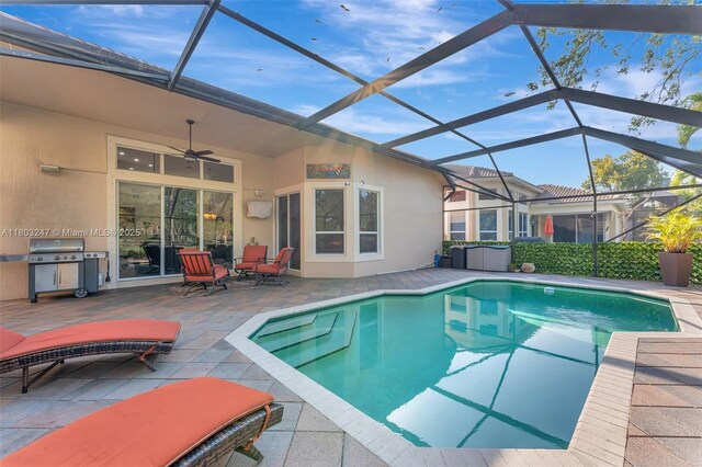 5957 NW 125th Ave, Coral Springs, FL 33076 - outdoor pool with a grill, a hot tub, a patio, a ceiling fan, and glass enclosure