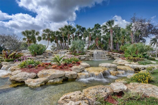 5957 NW 125th Ave, Coral Springs, FL 33076 - view of home's community with a small pond