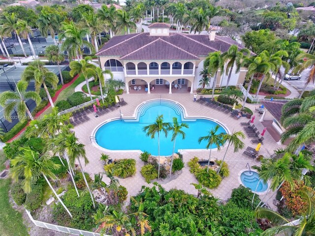 5957 NW 125th Ave, Coral Springs, FL 33076 - community pool featuring a patio area
