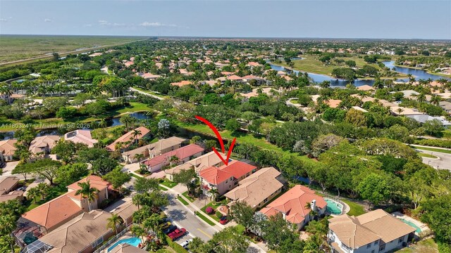 5957 NW 125th Ave, Coral Springs, FL 33076 - aerial view of residential area featuring a large body of water
