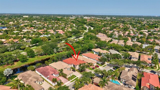 5957 NW 125th Ave, Coral Springs, FL 33076 - aerial perspective of suburban area featuring a large body of water