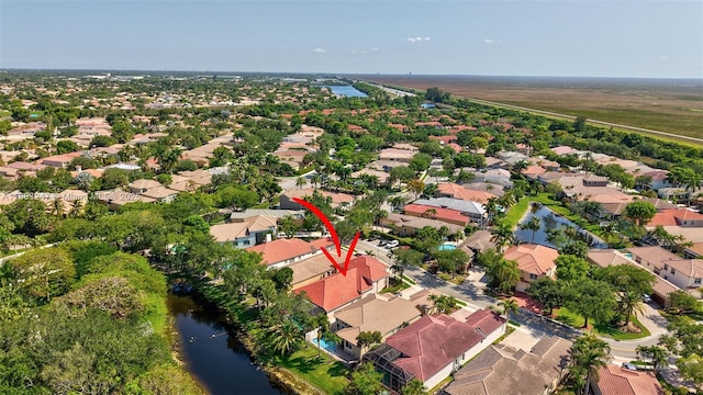5957 NW 125th Ave, Coral Springs, FL 33076 - aerial perspective of suburban area featuring a large body of water