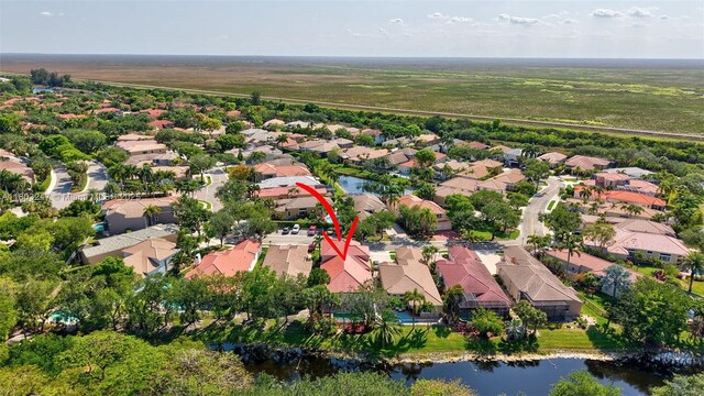 5957 NW 125th Ave, Coral Springs, FL 33076 - aerial overview of property's location featuring nearby suburban area and a large body of water