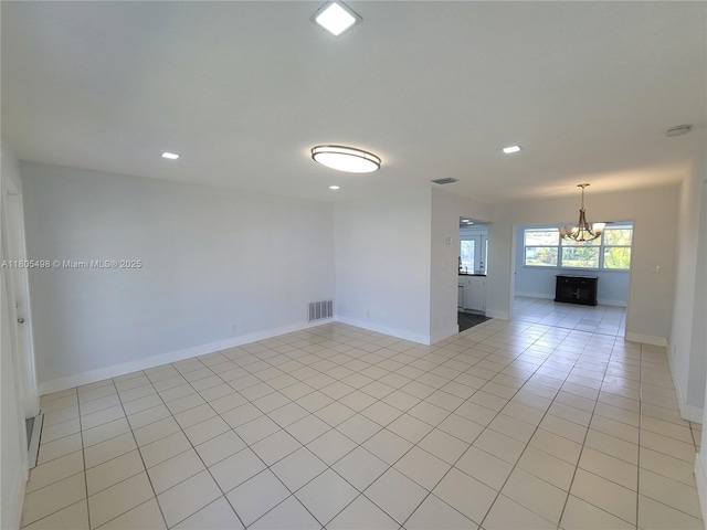 4519 NW 49th Dr, Tamarac, FL 33319 - unfurnished room with a chandelier, light tile patterned floors, recessed lighting, a smoke detector, and baseboards