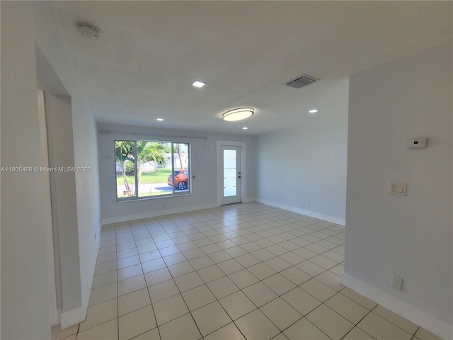 4519 NW 49th Dr, Tamarac, FL 33319 - empty room featuring a smoke detector, light tile patterned flooring, baseboards, and recessed lighting