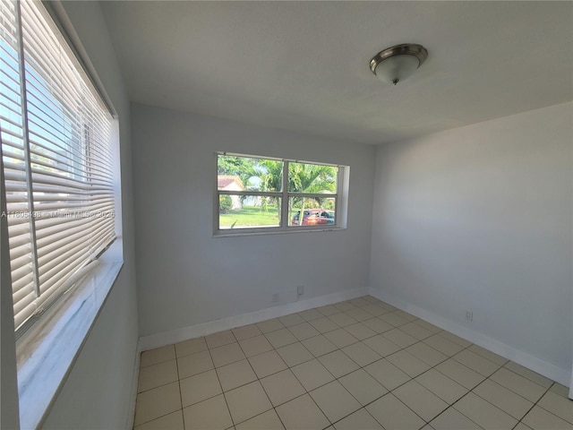 4519 NW 49th Dr, Tamarac, FL 33319 - empty room with light tile patterned floors and baseboards