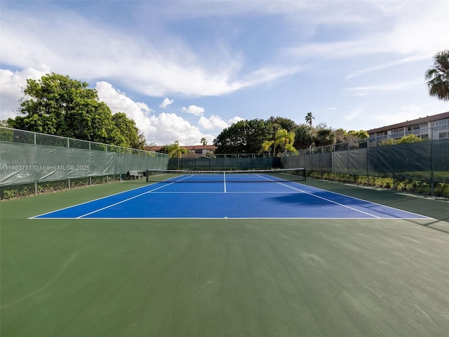 13250 SW 7th Ct Unit 208L, Pembroke Pines, FL 33027 - view of tennis court with fence and community basketball court