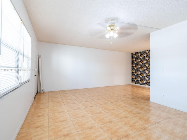 13250 SW 7th Ct Unit 208L, Pembroke Pines, FL 33027 - empty room featuring ceiling fan and a textured ceiling