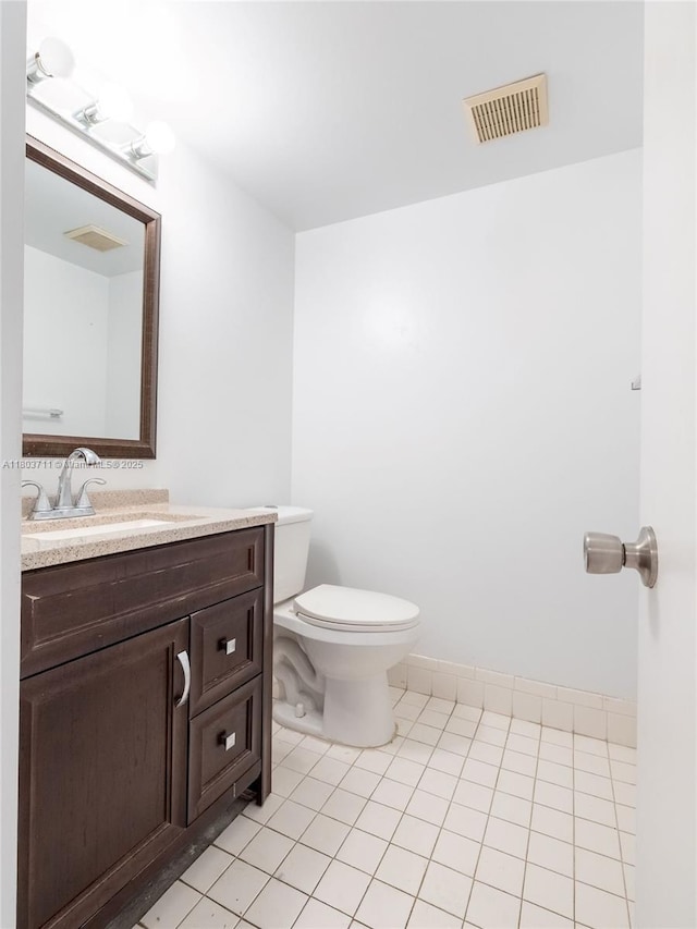 13250 SW 7th Ct Unit 208L, Pembroke Pines, FL 33027 - bathroom featuring toilet, vanity, and tile patterned floors