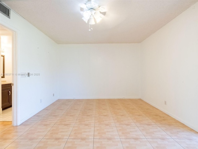13250 SW 7th Ct Unit 208L, Pembroke Pines, FL 33027 - spare room featuring ceiling fan and light tile patterned floors