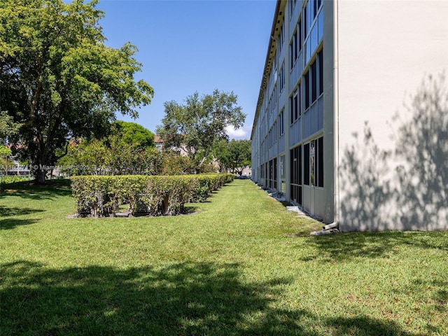13250 SW 7th Ct Unit 208L, Pembroke Pines, FL 33027 - view of grassy yard