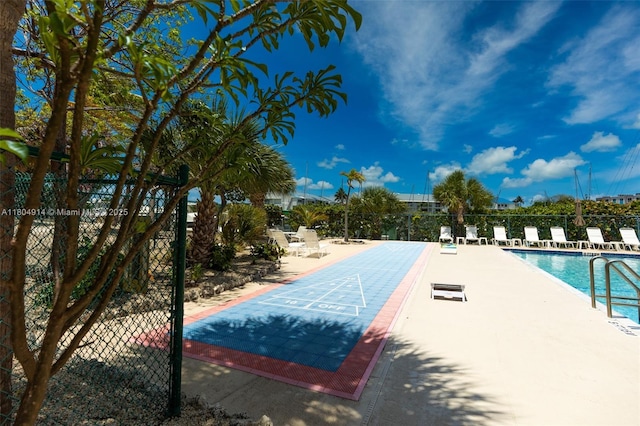2000 Coco Plum Dr Unit 301, Marathon, FL 33050 - community pool with shuffleboard and fence