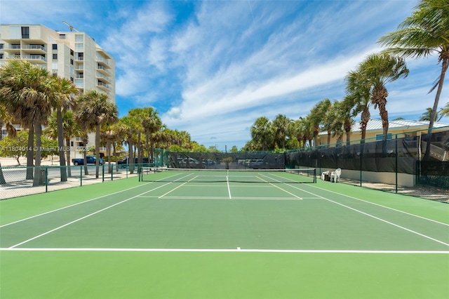 2000 Coco Plum Dr Unit 301, Marathon, FL 33050 - view of tennis court featuring fence and community basketball court