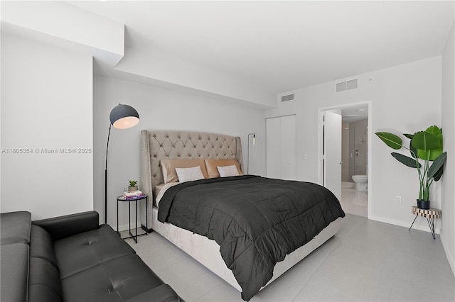 1100 S Miami Ave Unit 3210, Miami, FL 33130 - bedroom with baseboards and ensuite bathroom