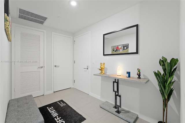 1100 S Miami Ave Unit 3210, Miami, FL 33130 - entryway with baseboards and light tile patterned flooring