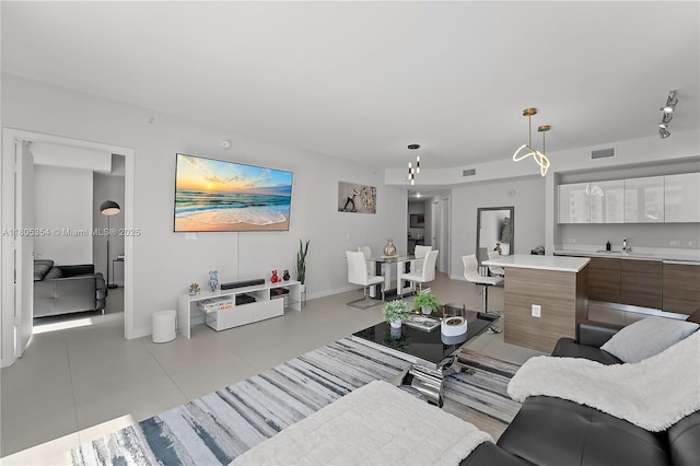 1100 S Miami Ave Unit 3210, Miami, FL 33130 - living area with light tile patterned floors and baseboards