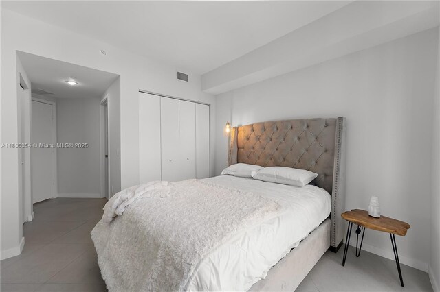 1100 S Miami Ave Unit 3210, Miami, FL 33130 - bedroom with a closet and light tile patterned flooring